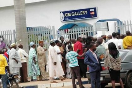 AIT-IMAGES - Bank customers at ATM gallery